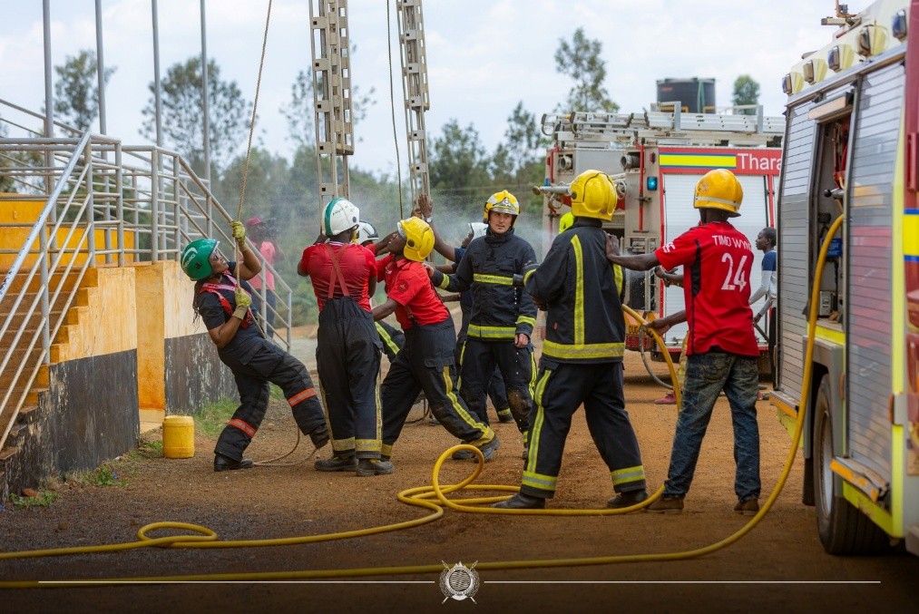 Bedfordshire trainers demonstrating hydraulic rescue tools during a fireman training session